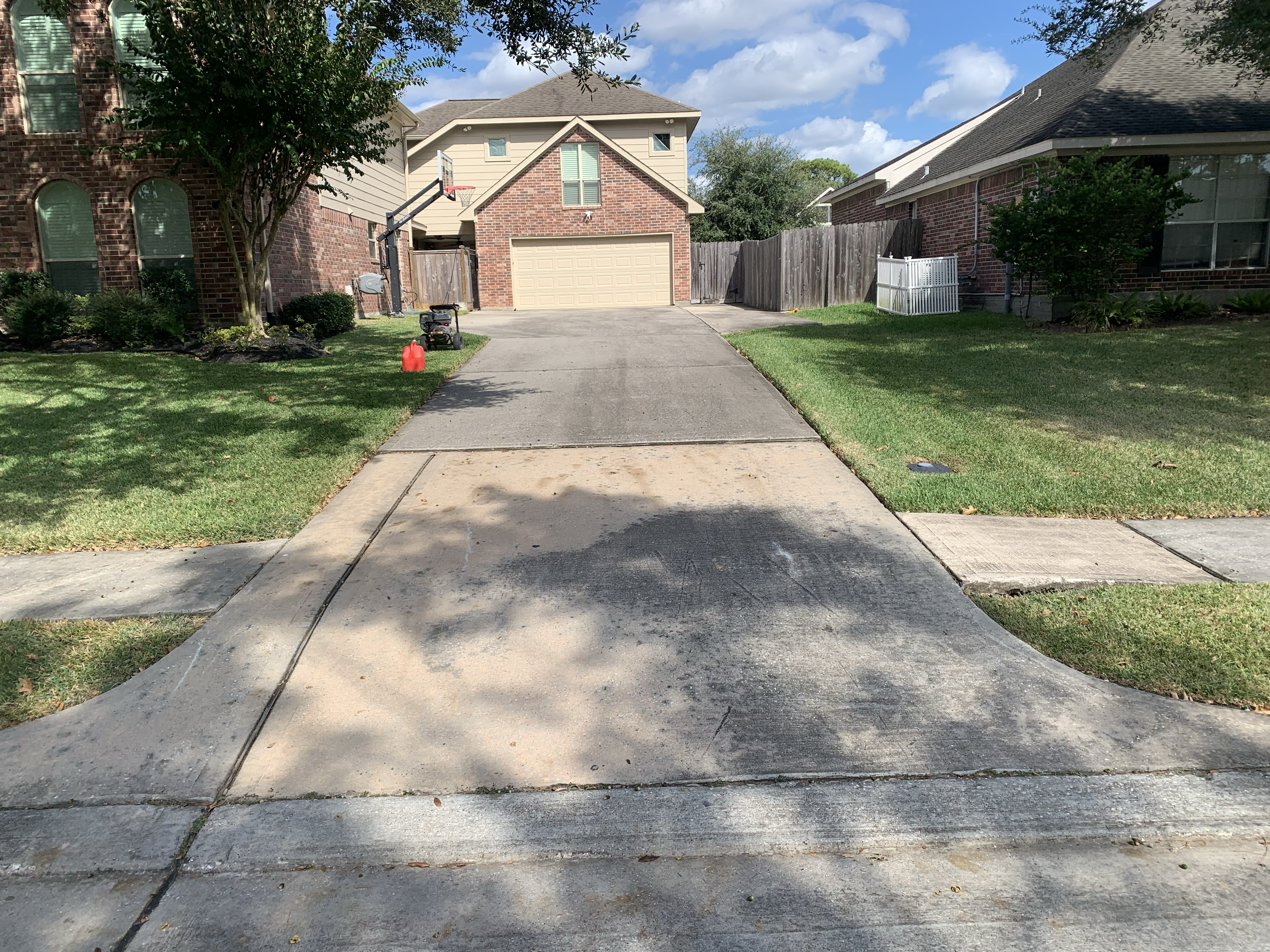 Mustang Power Washing - clean driveway result